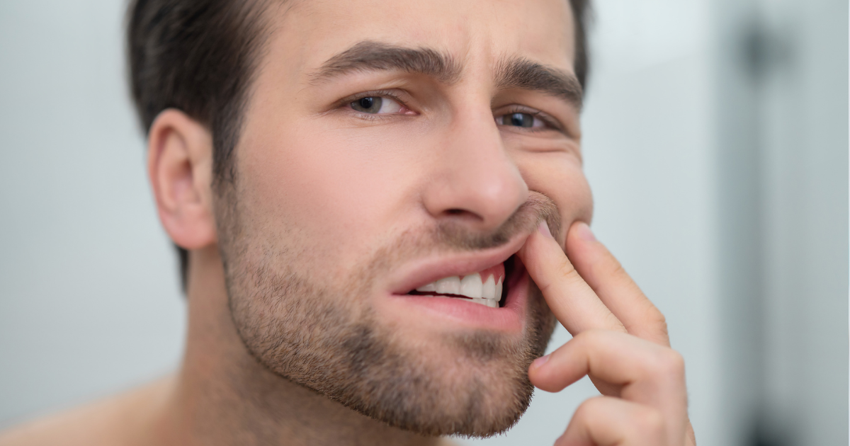 Red swollen gums showing early signs of gum disease