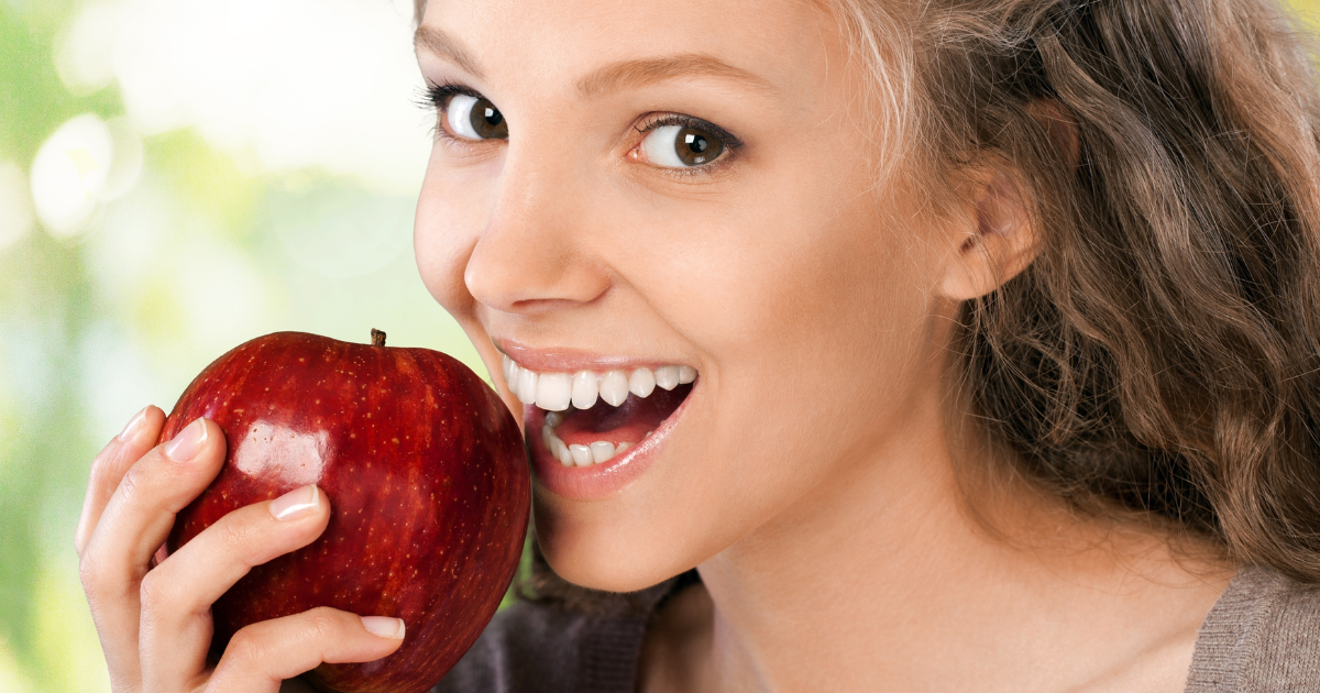 healthy foods like cheese, apples, spinach, and almonds for better teeth and gum health
