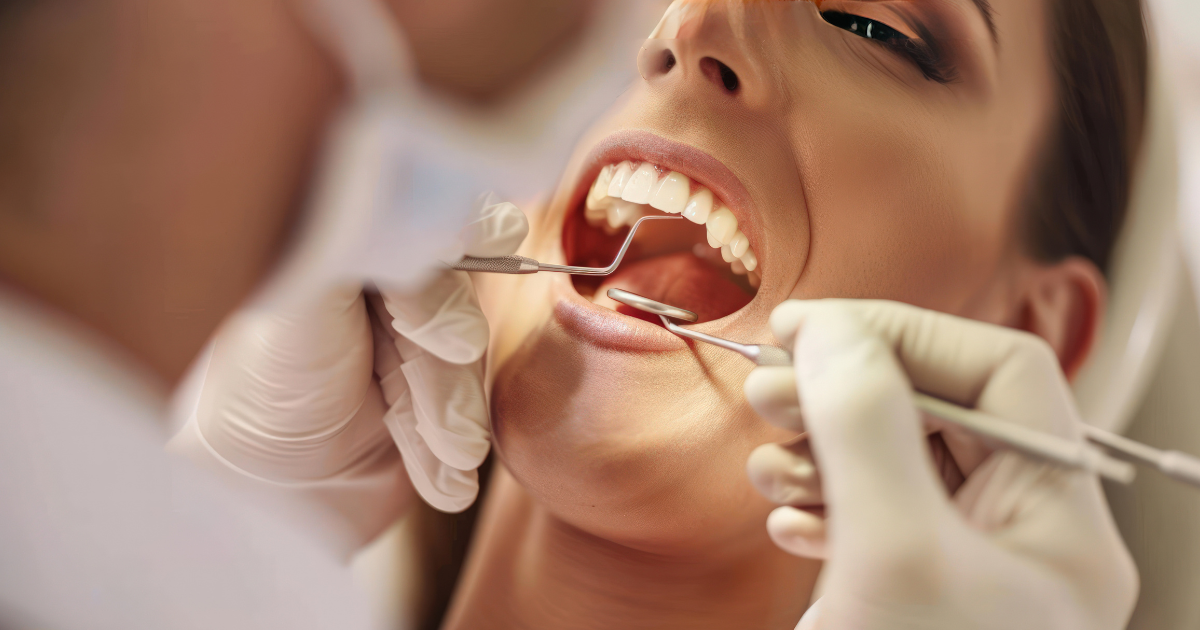 Dentist performing professional teeth scaling treatment for cleaner and healthier gums