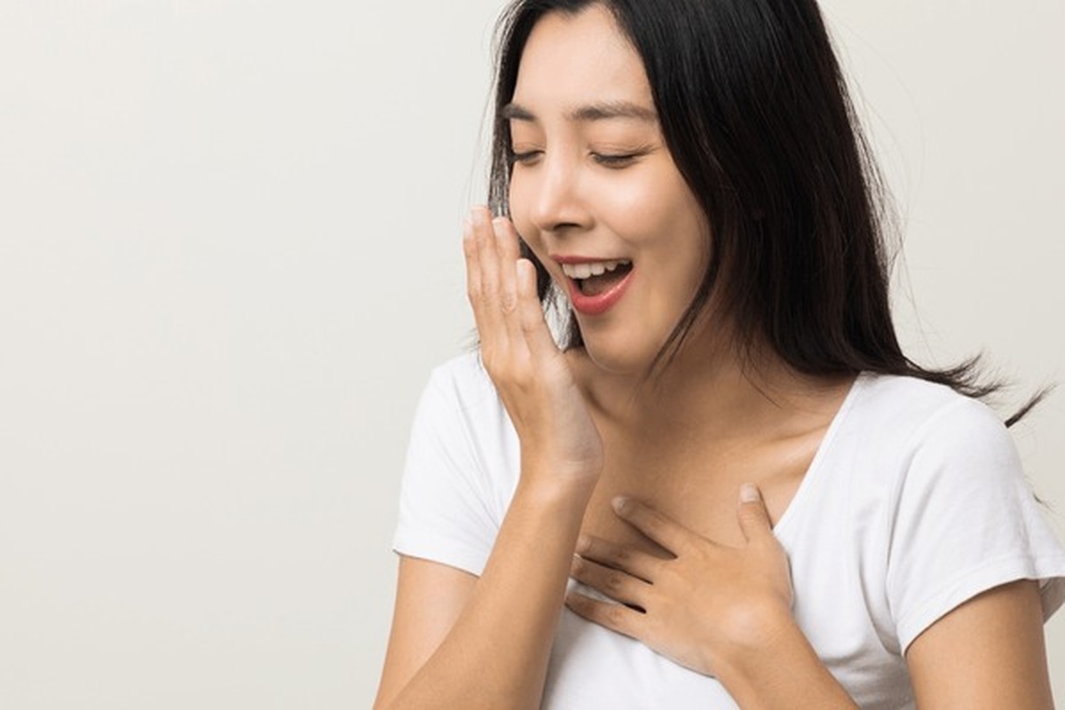 Illustration of the oral microbiome showing mouth bacteria and whole-body health connections.